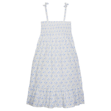 Tween dress with faux tie straps that has ruching across bust that has a green and blue floral print on top of white background.