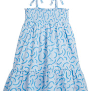 BISBY girl/tween dress featuring our Blue Ripple print. It has fixed ties on the shoulders for an elevated look and ruching along the bust for a flowy and stretchy comfortable fit!