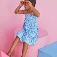 BISBY sundress with straps in light blue color with pool ripple details in darker blue. 