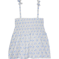 Girl/tween top that has faux tie straps with ruching across bust with blue and green floral print on a white background.
