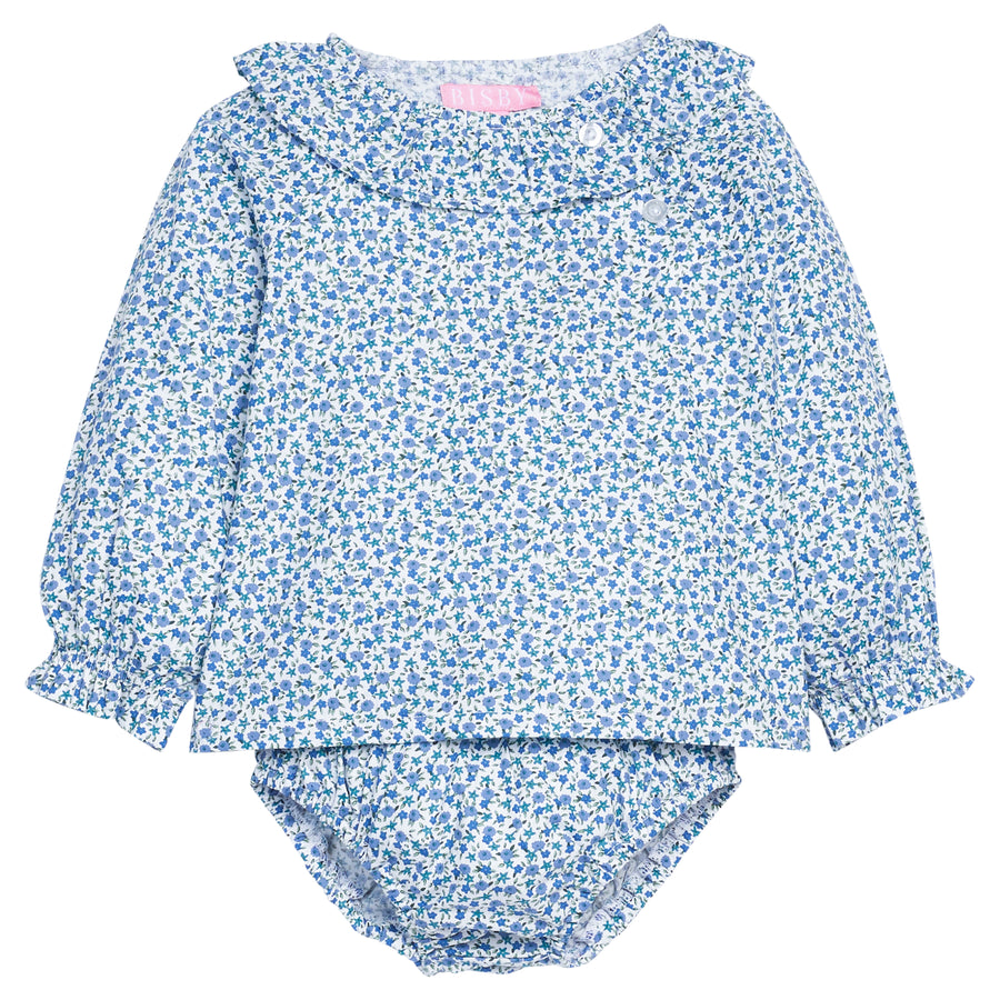 Baby girl bloomer set in a blue floral print that features button closure at the front top left neckline for easy put on access and a matching bloomer bottom with an elastic ruched waist.