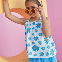 Tween girls top with BISBY blue flower pattern and square neck. 