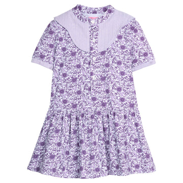 Girls purple floral dress with cable knit lavender accents at the collar and sleeves. Dress also features button closure down the front for easy put on access. 