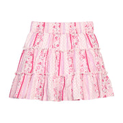 BISBY girl woven skort in a pink/purple/white floral pattern. Skort features outside surging detail along tiers and an elastic waistband for an elevated and secure fit/look.