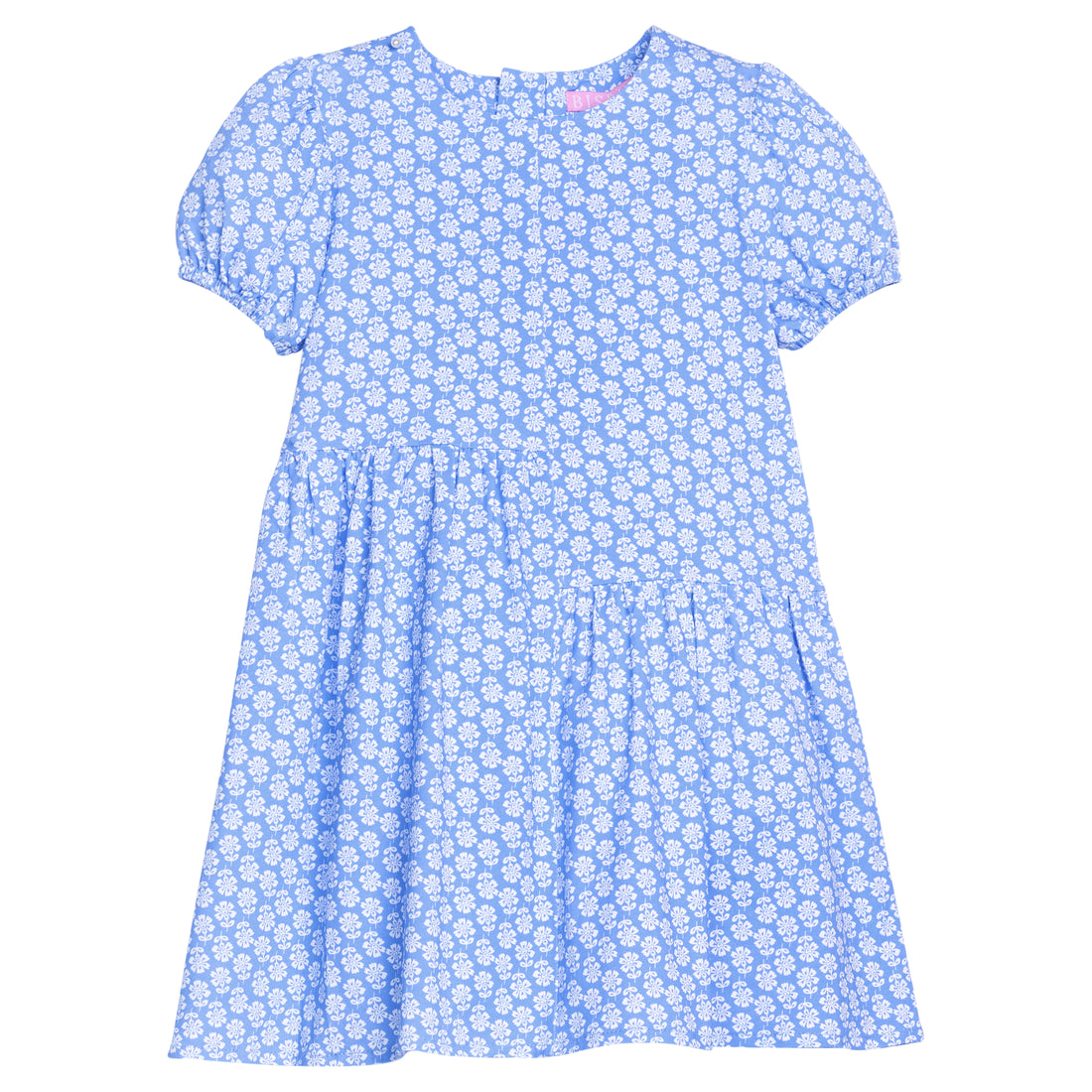 BISBY girl knit dress in a white/blue floral print. Dress features an asymmetrical cut body, elastic cuffs at sleeves, and a zipper closure along back of dress. 