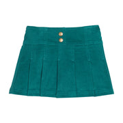 Girls/tween pleated green velvet skort with two faux gold buttons. Skort features an elastic waistband and built in shorts for a relaxed but secure fit. 