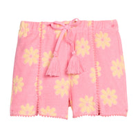 BISBY girl knit terry shorts in bubblegum pink/yellow floral print. Shorts feature pink pom pom detail along front of short and faux tie tassel for an elevated look.