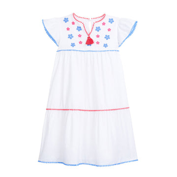 tween girls white tiered dress with blue and red embroidery detail on chest and tassels 
