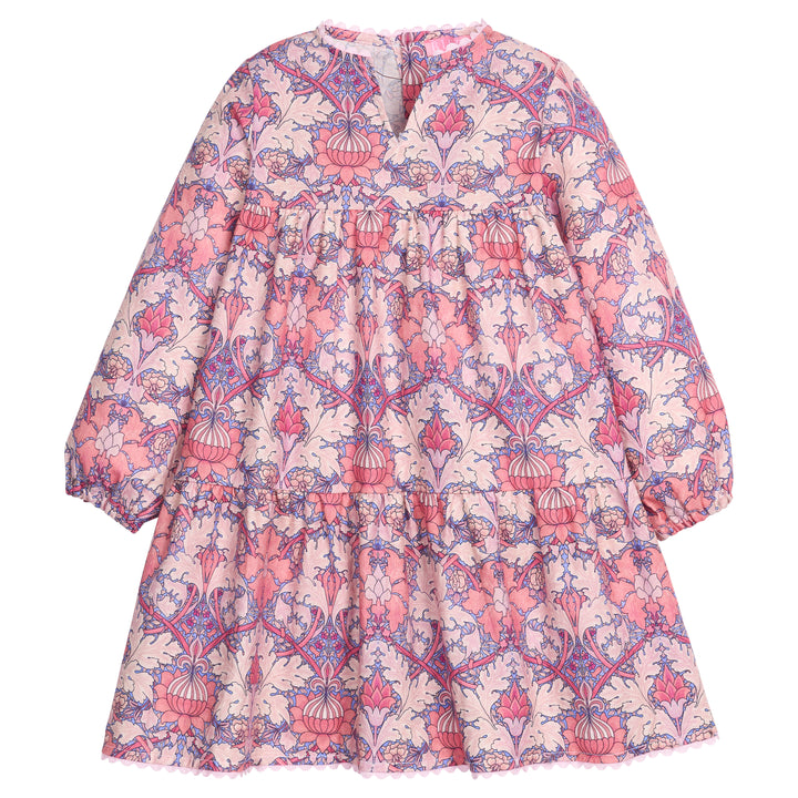Girls/tween woven dress in a purple/pink floral pattern that features button closures at back, ric rac detail along neckline and bottom of dress, and elastic cuffs at sleeves for a secure but relaxed fit. 