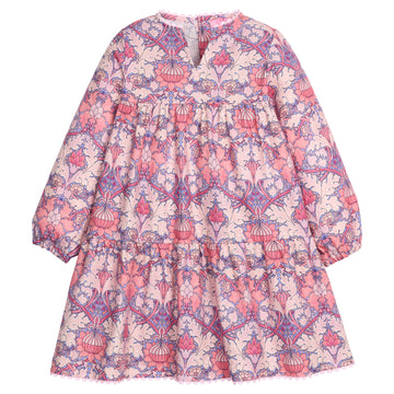 Girls/tween woven dress in a purple/pink floral pattern that features button closures at back, ric rac detail along neckline and bottom of dress, and elastic cuffs at sleeves for a secure but relaxed fit. 