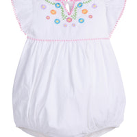 Baby girl woven bubble with ruffle/angel sleeves and slight v-neck neckline and multi-color flowers printed across the top. The bust-line and sleeves are also lined with pink pom poms and there are button closures along the stride. 