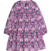 Girls/tween woven long sleeve dress in a navy/pink/cranberry color that features a slight v-neckline, ric rac detail along neckline and bottom tier of dress, and button closures along back of dress. 