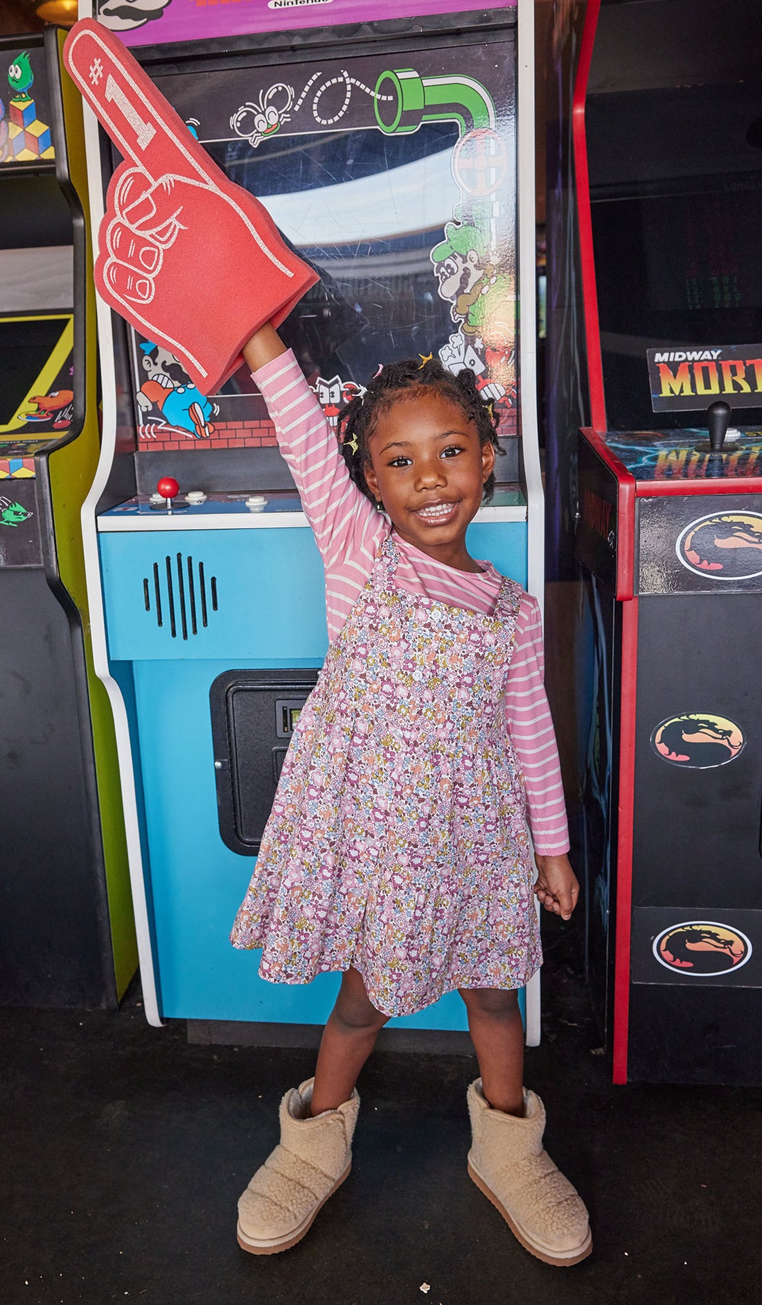 Girl seen wearing our Beatrice Pinafore - Radnor Rose Dress layered with our essential long sleeve tee (White and Pink Stripe)--BISBY girls