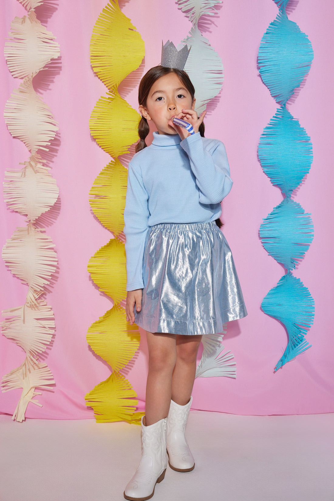 Girls/Tween ribbed turtleneck in an ice blue color. Turtleneck is made of a super soft and thick material perfect for the fall/winter months. Pair it back with the circle skirt in the matching ice blue shade for a perfect look.