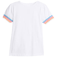 Girl/teen white basic t-shirt that has blue, pink, and orange rice-rac pattern along bottoms of sleeves.