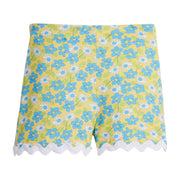 Girls/Tween knit shorts in a yellow/green/aqua floral print. Shorts feature an elastic waistband for a comfy fit and also have a gorgeous white ric rac detail along bottom. 