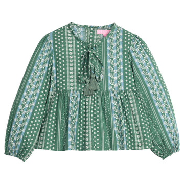 Girls/tween woven long sleeve top in a green/blue floral print. Top features tie tassel detail at neckline, elastic cuffs at sleeves, and button closures at back.