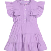 Girls/tween corduroy dress in Lavendar that features button closures at front, angel sleeves, and tier details for an elevated look. 