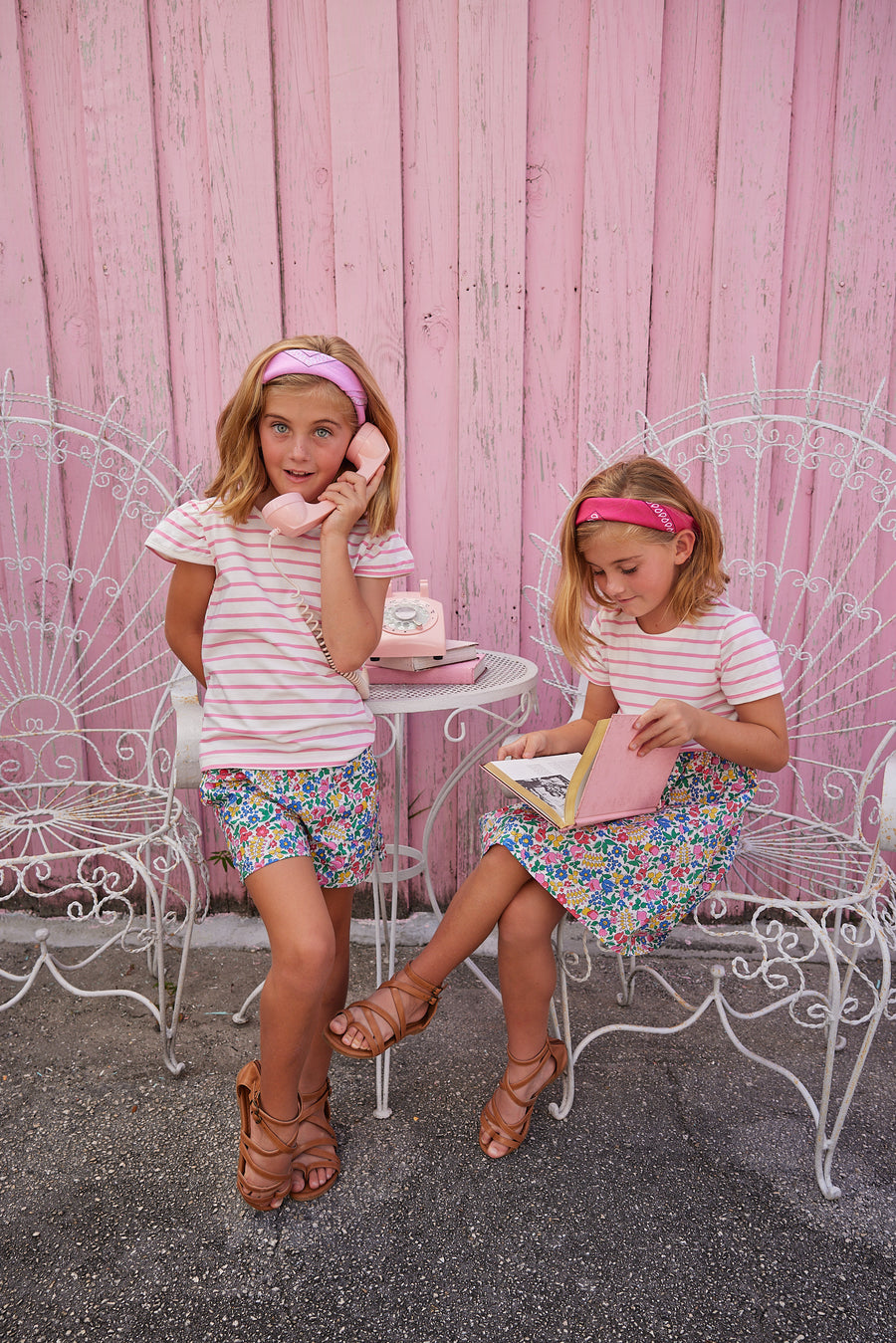 BISBY girl Rosie Short Set in Tulip Garden. Top is pink and white stripe with angel sleeve paired with our shorts in our Tulip Garden colorful floral which pairs perfectly with our Rosie Dress in Tulip Garden. Top half of dress is knit pink and white stripe with a woven bottom half in our Tulip Garden floral print