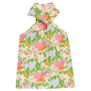 BISBY tween girl woven top in a green/orange/pink/light blue floral print. Top features a crossover neckline feature (scarf) with keyhole button closure at back for an elevated look. 