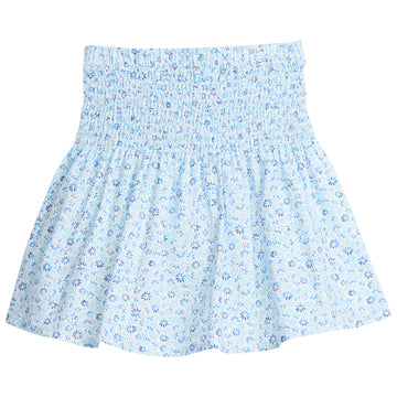 Tween skirt with ruching across top half, covered in light blue and darker blue daisies.