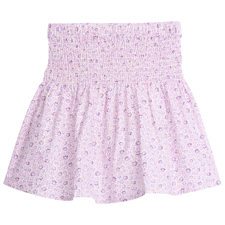 Tween skirt with ruching across top half, covered in light purple and darker purple daisies.