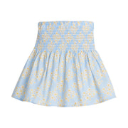 Girls/Tween woven skirt with ruching across top half in a light blue/yellow/white floral print.