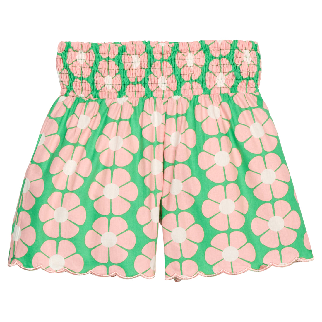 BISBY girl woven shorts with a green and salmon pink floral print. Shorts feature a smocked waistband, pockets, and a scallop bottom hem for an elevated look. 