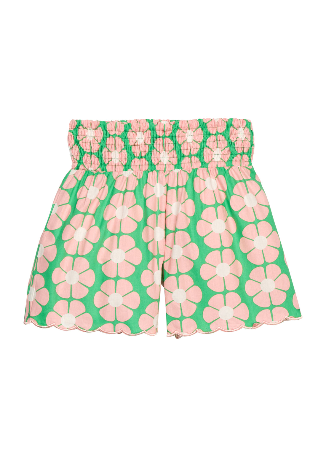 BISBY girl woven shorts with a green and salmon pink floral print. Shorts feature a smocked waistband, pockets, and a scallop bottom hem for an elevated look. 