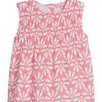 Girls/Tween sleeveless woven top in a salmon/pink and white floral print. Top features ruching at the bust and fans out for a relaxed comfy fit. 