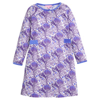 Girls/tween woven dress in blue/purple/white floral that features button closure at front neckline and blue velour detail along outside trim of dress for an elevated look. 
