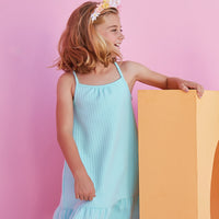 Girl/tween dress with thin stretchy straps and a waffle knit pattern, all in a solid aqua color. 