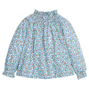 Girls/tween woven top in blue/green/brown floral print that features an elastic high neck collar and elastic cuffs at sleeves for a secure but relaxed fit. 