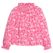 Girls/tween rayon top in pink/red/white floral print that features an elastic high neck collar and elastic cuffs at sleeves for a secure but relaxed fit. 