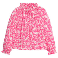 Girls/tween rayon top in pink/red/white floral print that features an elastic high neck collar and elastic cuffs at sleeves for a secure but relaxed fit. 