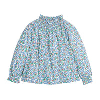 Girls/tween woven top in blue/green/brown floral print that features an elastic high neck collar and elastic cuffs at sleeves for a secure but relaxed fit. 