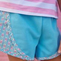 BISBY Track Shorts in Blue Daisy chain, athletic material with light blue/pink/green floral