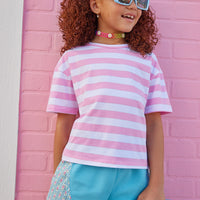 pink and white striped t shirt for girls with silver metallic stripes paired with blue track shorts for girls with floral sides