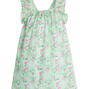 Girl/Tween woven  dress with adjustable ruffle straps and has a light green/white/pink  floral pattern. 