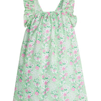 Girl/Tween woven  dress with adjustable ruffle straps and has a light green/white/pink  floral pattern. 