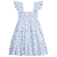 Girl/tween dress with ruffle sleeves and ruching across bust, also features a light blue background with white flowers and yellow centers printed cross body of dress.