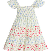 Girls/Tween woven dress with blue and red floral print. Dress features angel sleeves and ruching at bust for a comfy and airy fit. 