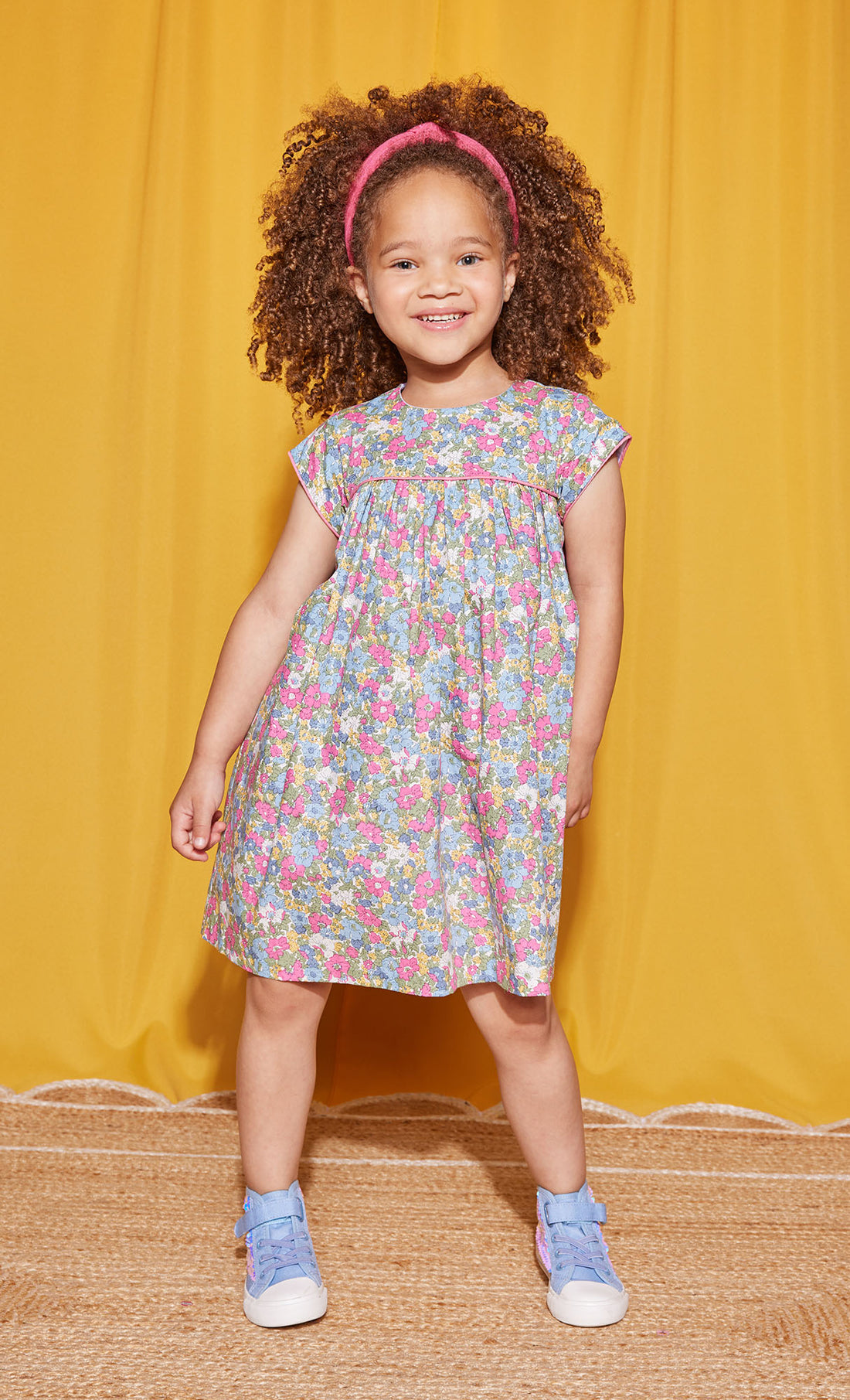 Little girl seen wearing our Charlotte Dress in Merion Floral--BISBY girl