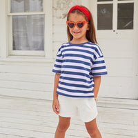 Boxy tee in Navy, White, and Metallic stripe paired with white basic shorts