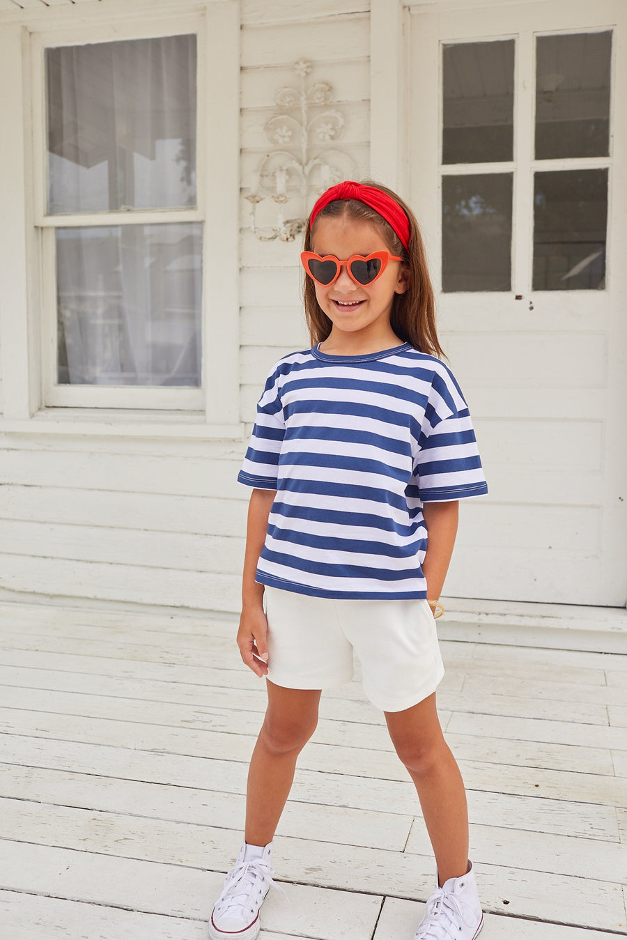 Boxy tee in Navy, White, and Metallic stripe paired with white basic shorts