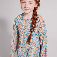 girls tween clothing flowy floral blue and yellow blouse with pleats on chest and ruffles at collar