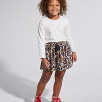 cotton white long sleeve shirt with a navy floral skirt with tassel ties for girls 