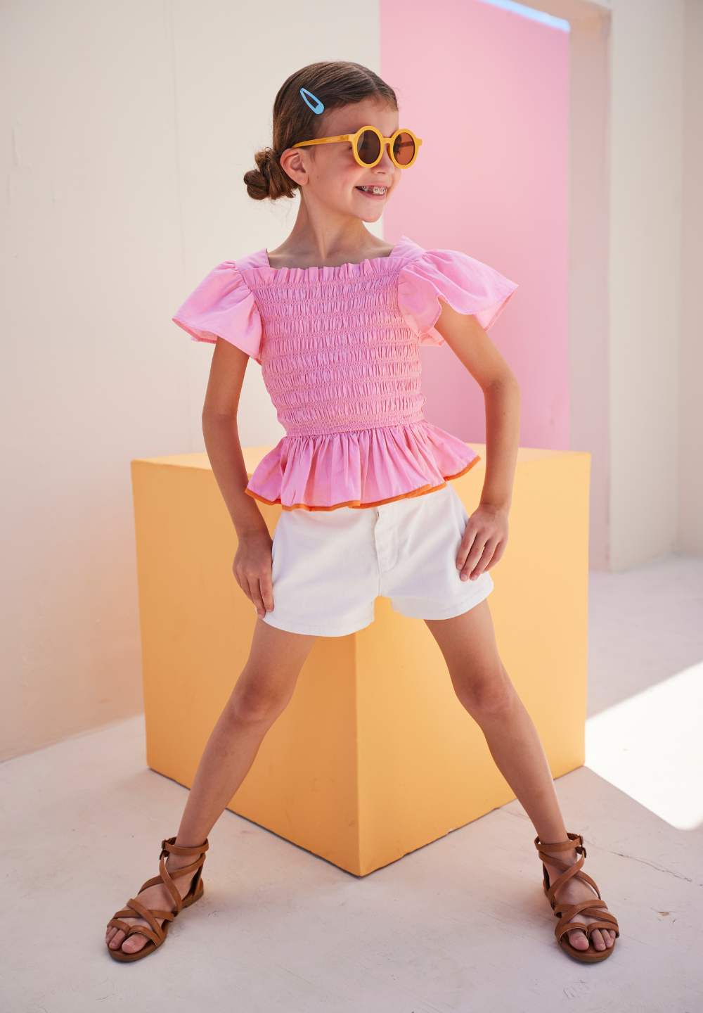 tween girls ruched peplum top in pink with orange trim