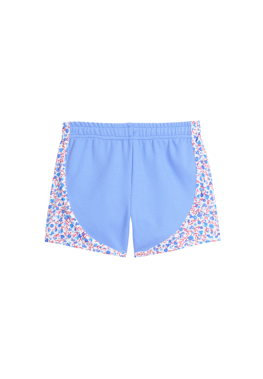 tween girls blue track shorts with red and blue floral pattern at the sides