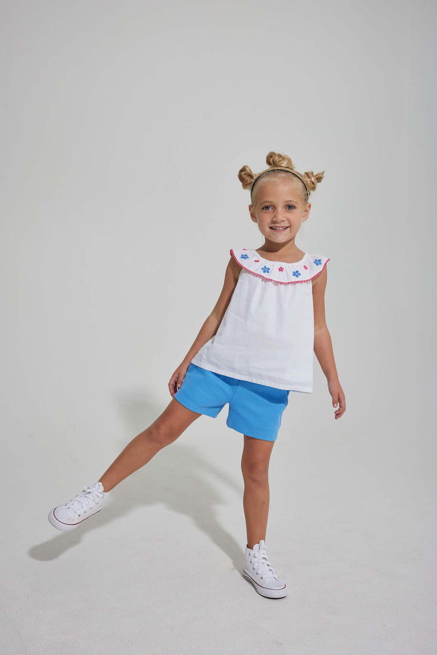 tween girls white tip with embroidered and pom pom trim neckline